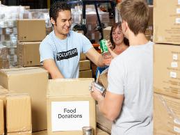 A volunteer at a food bank had a lifting restriction from a back condition and had trouble moving heavy donation deliveries to the sorting area.
