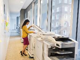 An employee with sarcoidosis has been having problems when needing to leave her workstation to use the copier due to her legs swelling when they are not elevated.