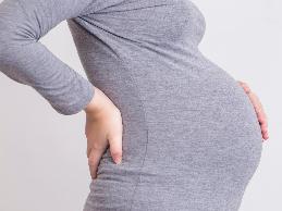 A nursing assistant for a rehabilitation hospital was in the third trimester of her pregnancy and, due to complications, was restricted from lifting more than twenty pounds.